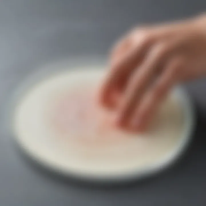 An agar plate being streaked with a bacterial inoculum for isolation