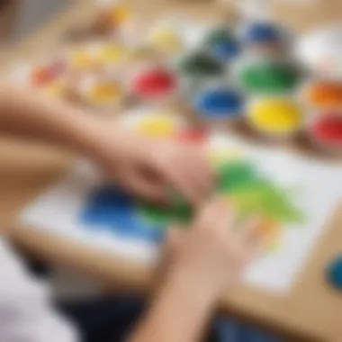 Child's hand creating masterpiece with non-toxic finger paint