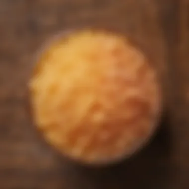 The Luxurious Texture of Sugar Scrub Artistic representation of a sugar scrub texture on a wooden surface