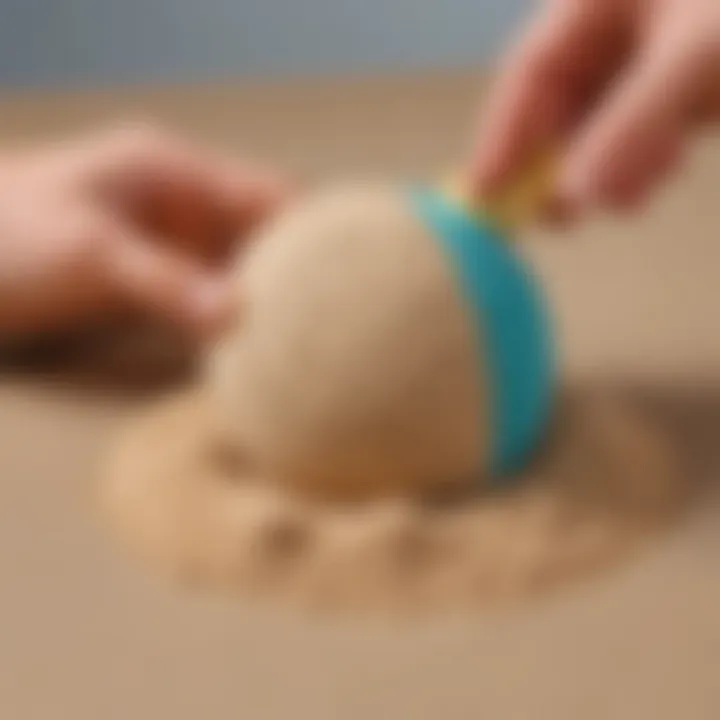 Kinetic sand stress ball for tactile scientific exploration