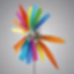 Colorful wind turbine model with blades spinning in the wind