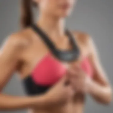 Person wearing a heart rate monitor with chest strap during workout