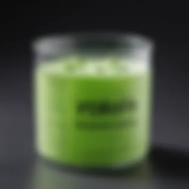 Boric acid powder in a container showcasing its chemical structure